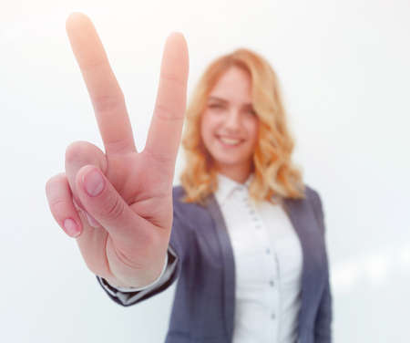 stylized image.business woman showing victory sign.の写真素材