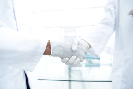 Medical gloves make shaking handsの写真素材