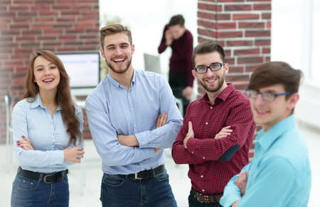 Happy smiling business team in office.の写真素材