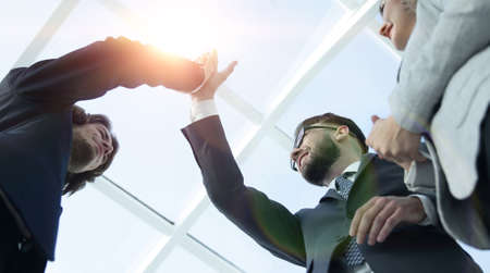 Successful business people handshaking closing a deal