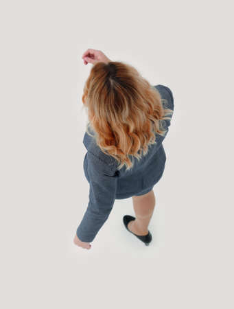 view from the top. business woman stepping forward .の写真素材