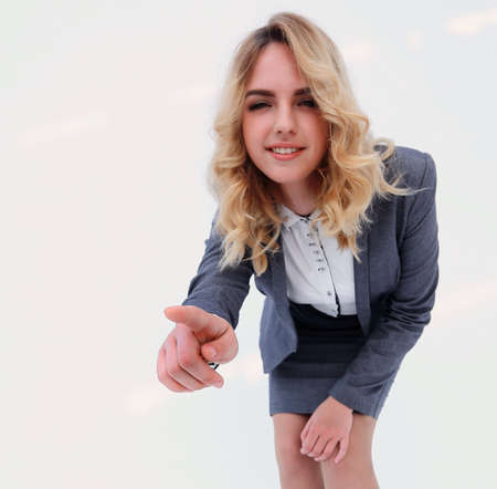 beautiful business woman showing forwardの写真素材
