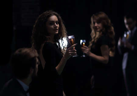 two glamorous woman in a casinoの写真素材