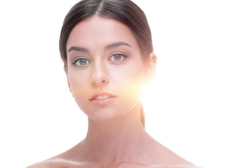 close-up portrait of a young woman with natural make-up.の写真素材