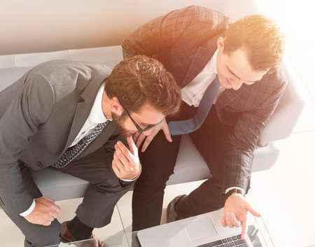employees working with a laptopの写真素材