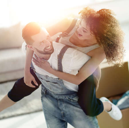 Wife and husband are happy to move to a new apartment.の写真素材