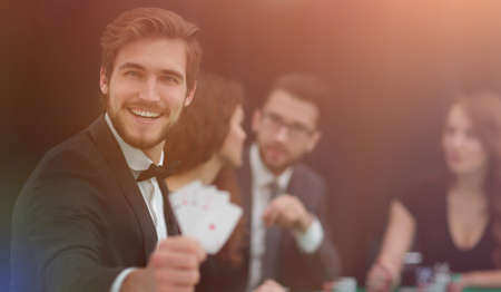 player to the casino with a combination of four aces.