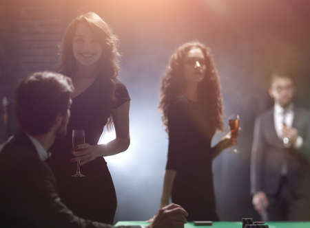 two glamorous couples, have fun in the casinoの写真素材