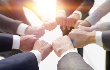 closeup.business people show a circle of hands.の写真素材
