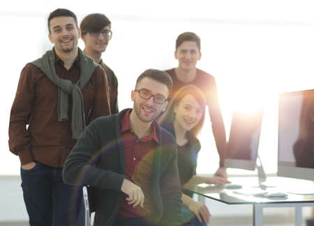 portrait of friendly business team in office.