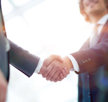 Businessman making handshake - success, dealing, merger and acquisition conceptsの写真素材