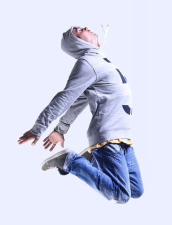 modern guy is dancing breakdance.の写真素材