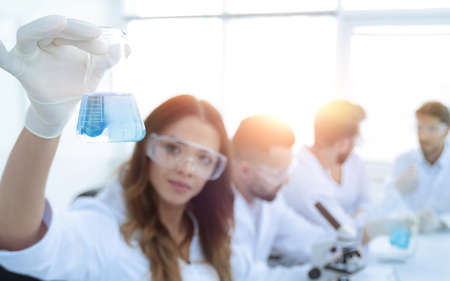 group of young scientists working in the laboratory.の写真素材