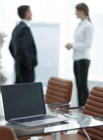 open laptop on the desktop, in the conference room. workplaceの写真素材