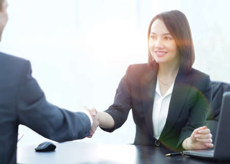 Negotiating business,Image business woman handshakeの写真素材