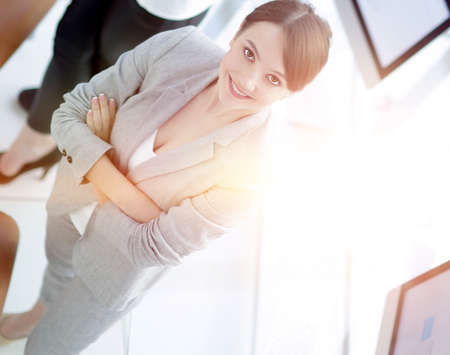 view from the top.successful young business woman looking at camera.
