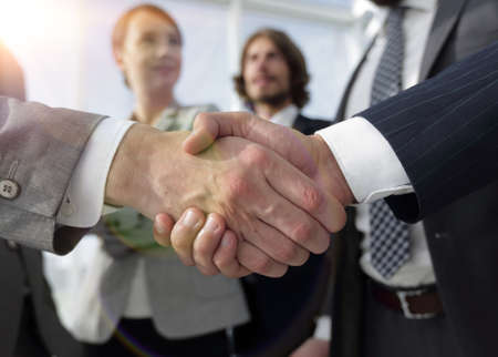 welcome and handshake business peopleの写真素材