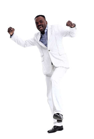 cheerful black african man celebration cheer in studioの写真素材