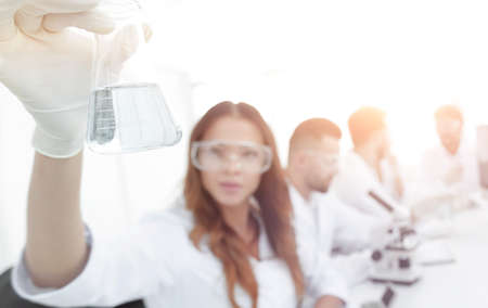 group of young scientists working in the laboratory.の写真素材