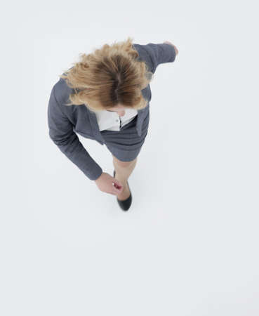 view from the top. business woman stepping forward .の写真素材