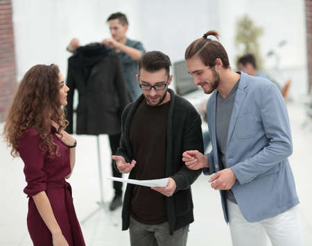 group of designers discussing the sketches.の写真素材