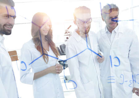 group of laboratory employees.