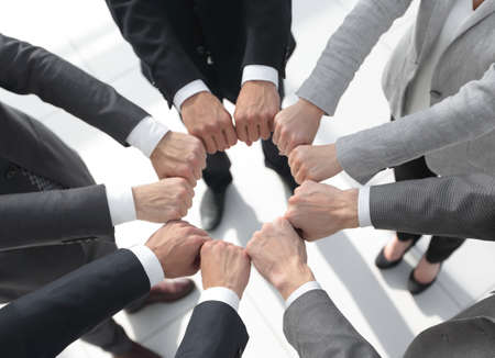 closeup.business people show a circle of hands.の写真素材