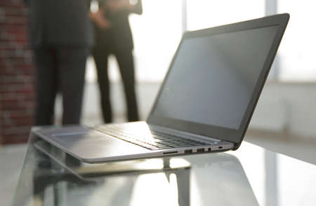 workspace table works in the office with a computerの写真素材