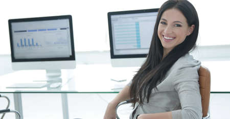 business woman working with financial charts on computerの写真素材