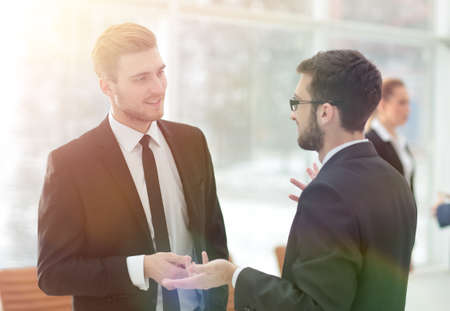 business colleagues talking in the officeの写真素材