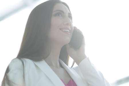 female lawyer talking to a client on the smartphoneの写真素材
