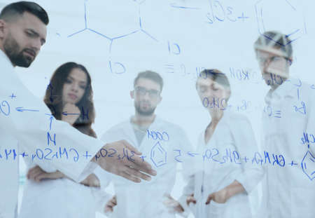 in the background image group laboratory scientists discussing tの写真素材