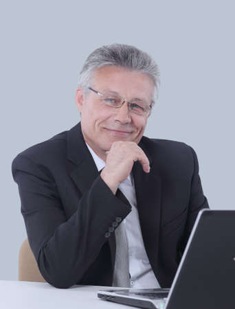 Portrait of a mature gray-haired  business man isolated on white