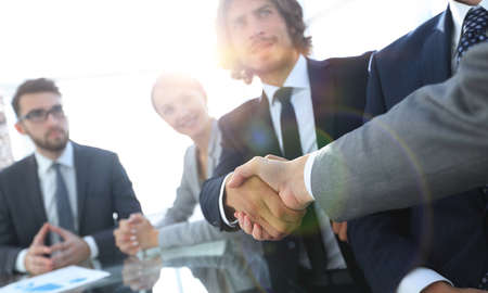 background image of handshake of business partnersの写真素材