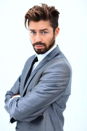 Portrait of a handsome man, isolated over a white backgroundの写真素材
