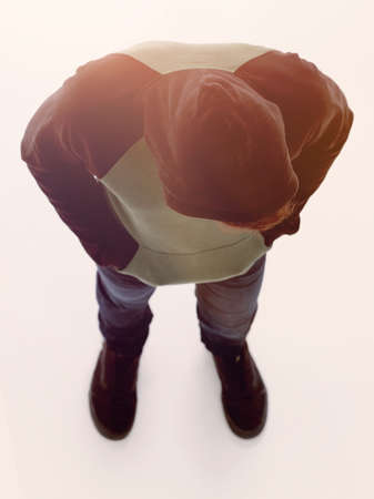 view from above. Hipster in a jacket with a hood looking down