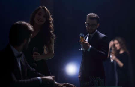 beautiful couple spends an evening in the casinoの写真素材