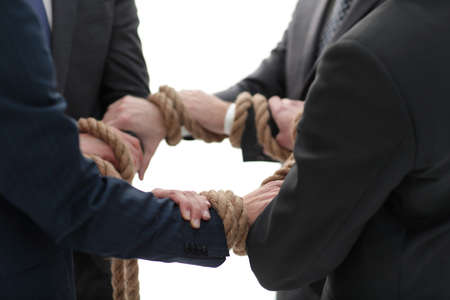 closeup.Hands holding rope forming a circleの写真素材