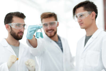 scientists rejoice at the result of their work.の写真素材