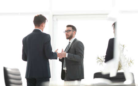 employees of the company standing in the officeの写真素材