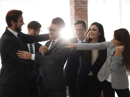 Portrait of businessman leading his team at office.の写真素材
