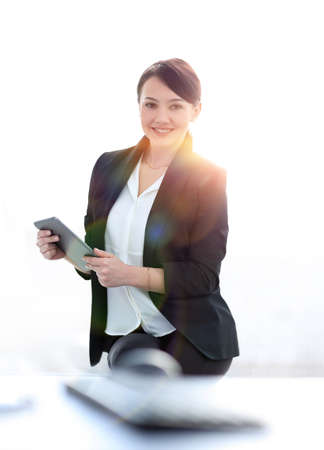 closeup of a successful young business woman with tablet computerの写真素材