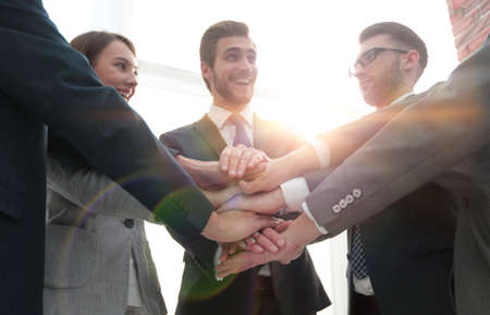 Group of Friends with Hands in Stack, Teamwork