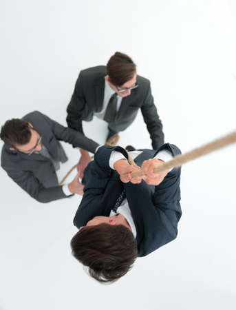 top view .business team helps the leader to climb up.の写真素材
