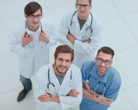 view from the top. team of doctors looking at the cameraの写真素材