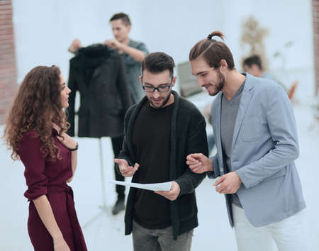 group of designers discussing the sketches.の写真素材