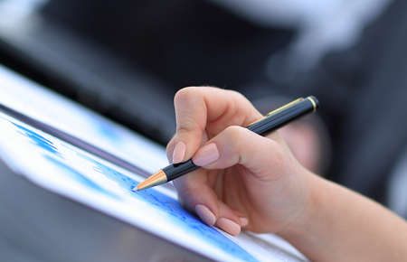 closeup.colleagues discussing marketing chartsの写真素材