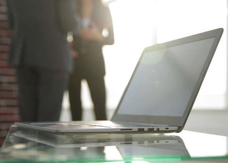 workspace table works in the office with a computerの写真素材
