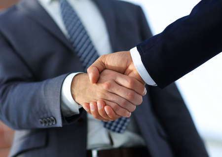 Business men giving a handshake. Business conceptの写真素材