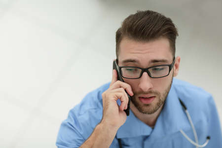 doctor speaking on the phone